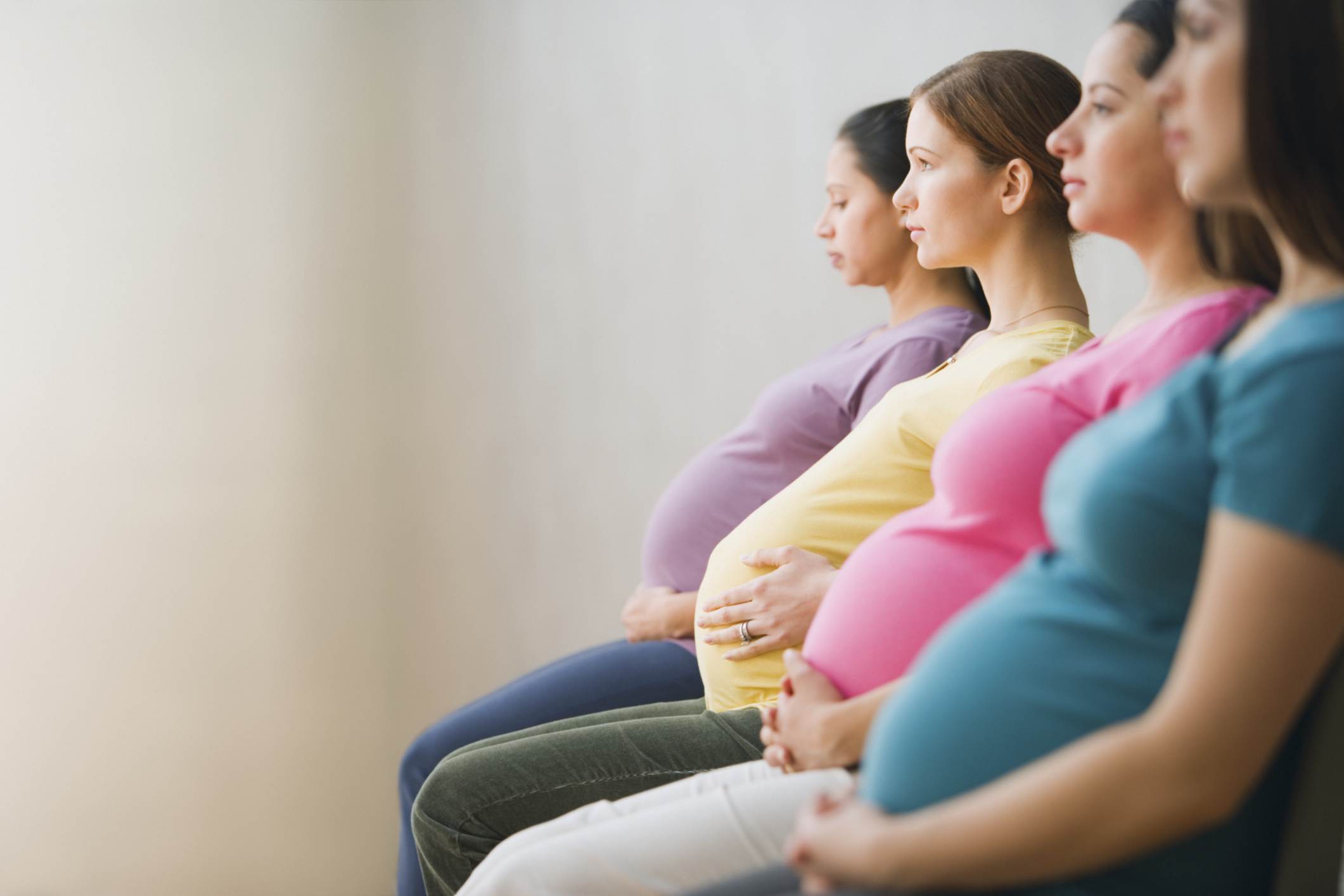 a line of pregnant women