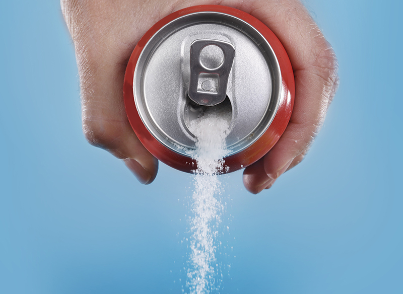 coke can pouring out sugar 