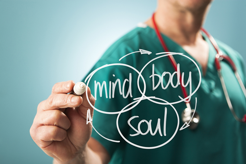 Dr. writing Mind, Body, Soul