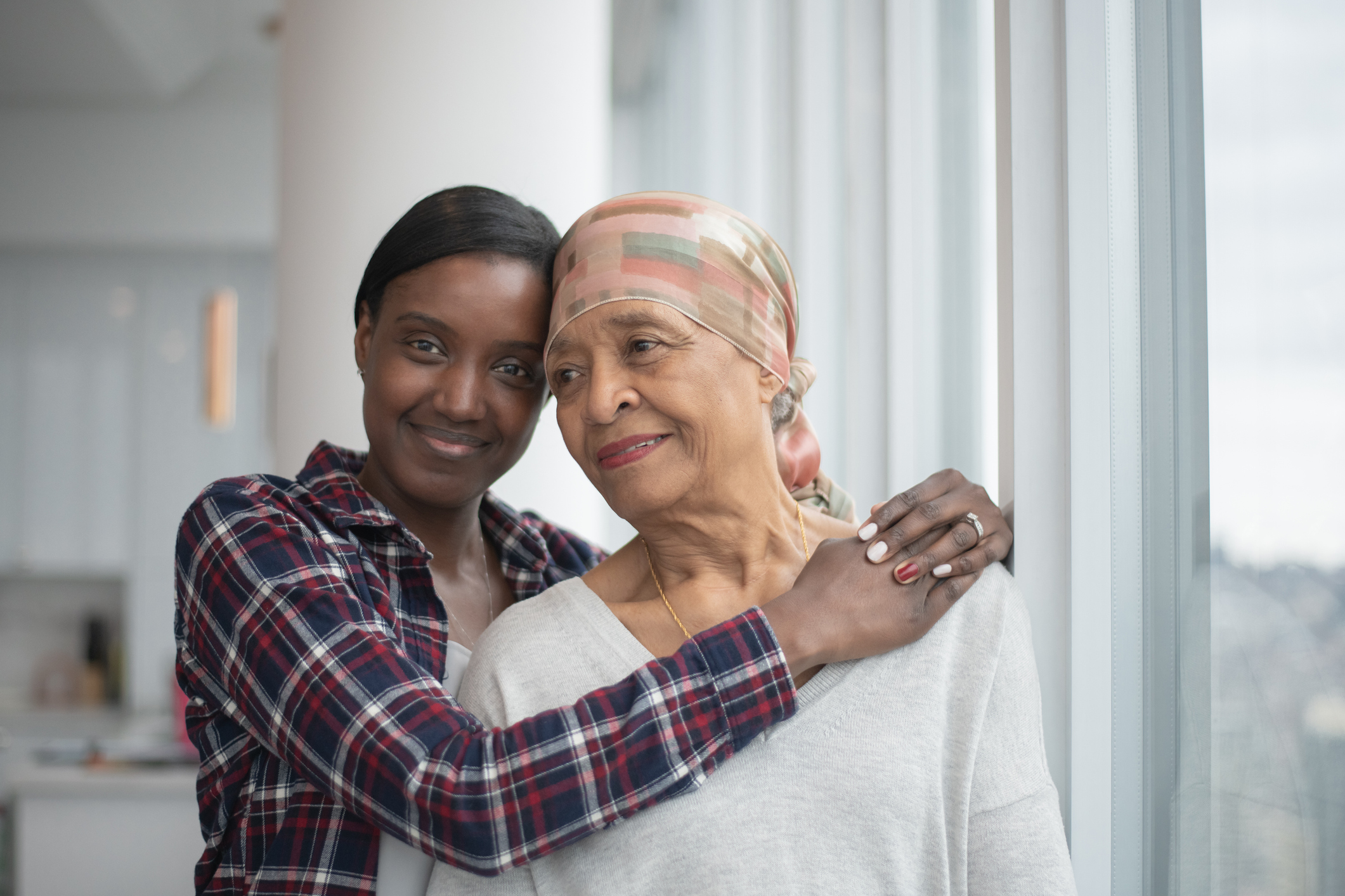 Daughter Hugging Her Mother with Cancer