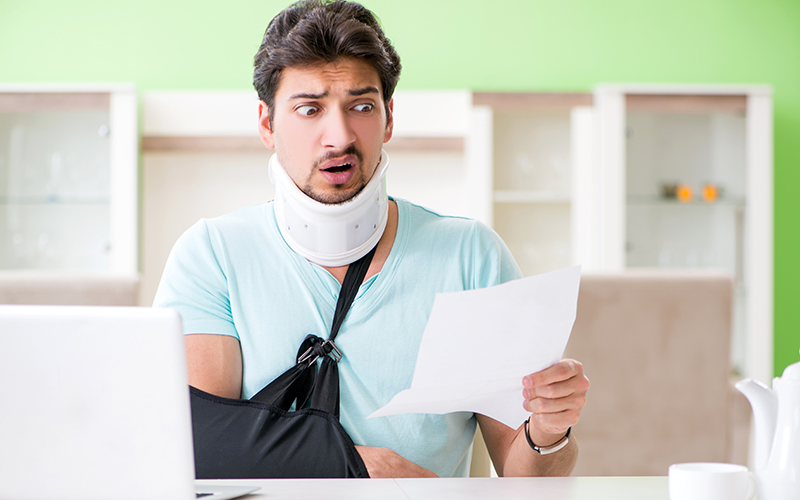 man with neck arm injury