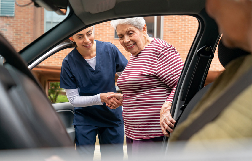 senior women getting in the car