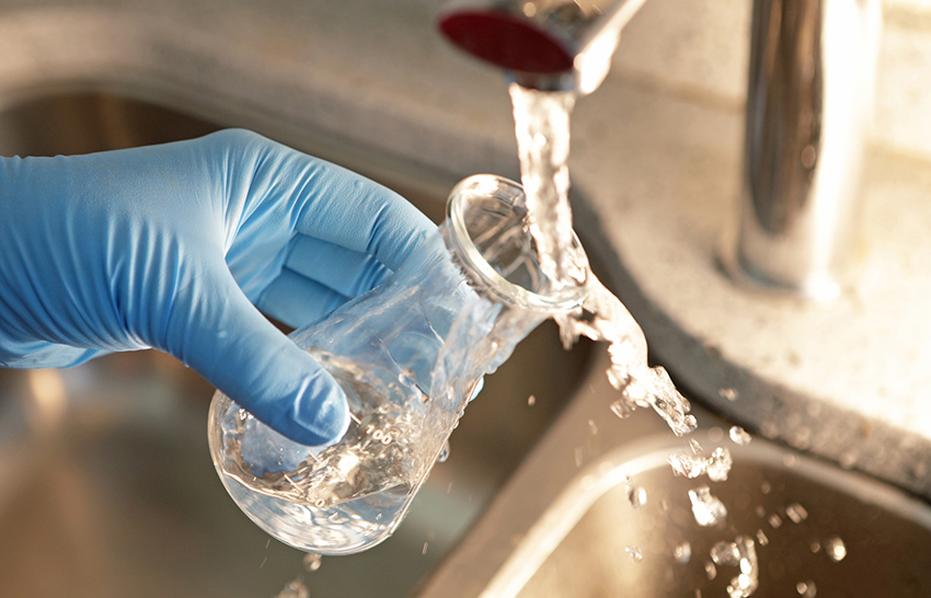 Filling beaker with water