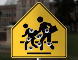 Street crossing sign with bullet holes