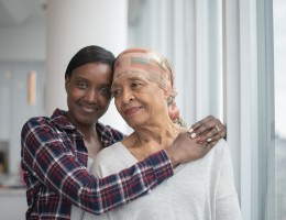 Daughter Hugging Her Mother with Cancer