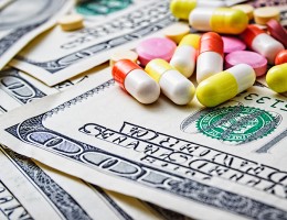prescription pills on $100 bills