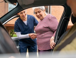 senior women getting in the car
