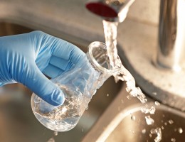 Filling beaker with water