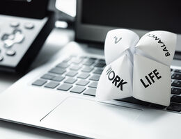 computer with paper for Work-Life-Balance
